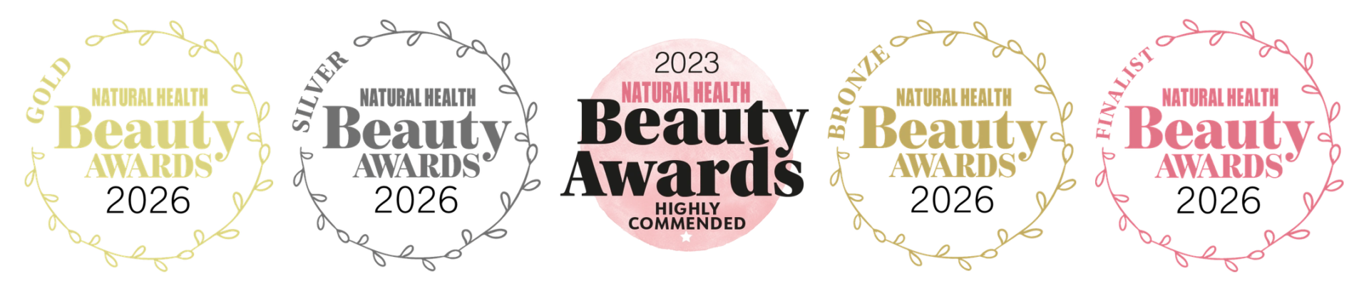 LE PURE Natural Health Beauty Awards logos: 2026, 2023 