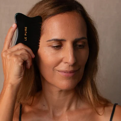 Scalp massage with the gua sha comb