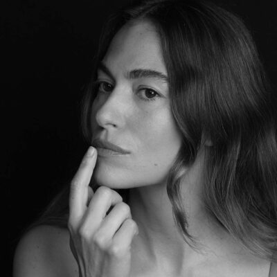 Woman applying Dry Lips Treatment