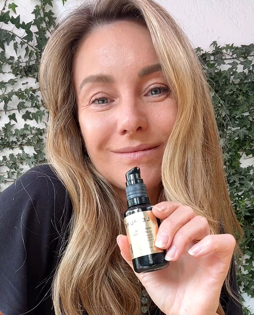 Actress Dominika Paleta's skin prepared with LE PURE organic skincare and foundation for her Amazon Prime Video series