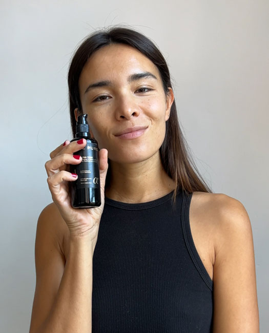 Model Elena Santamaria Chan's skin prepared with LE PURE organic skincare and foundation