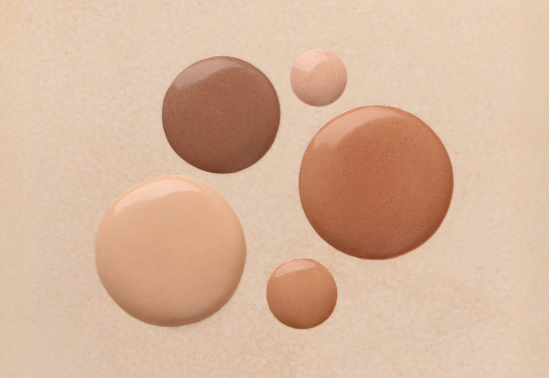 Perfecting Illumination — LE PURE organic makeup foundation texture swatches in different shades of the world's most natural certified organic foundation